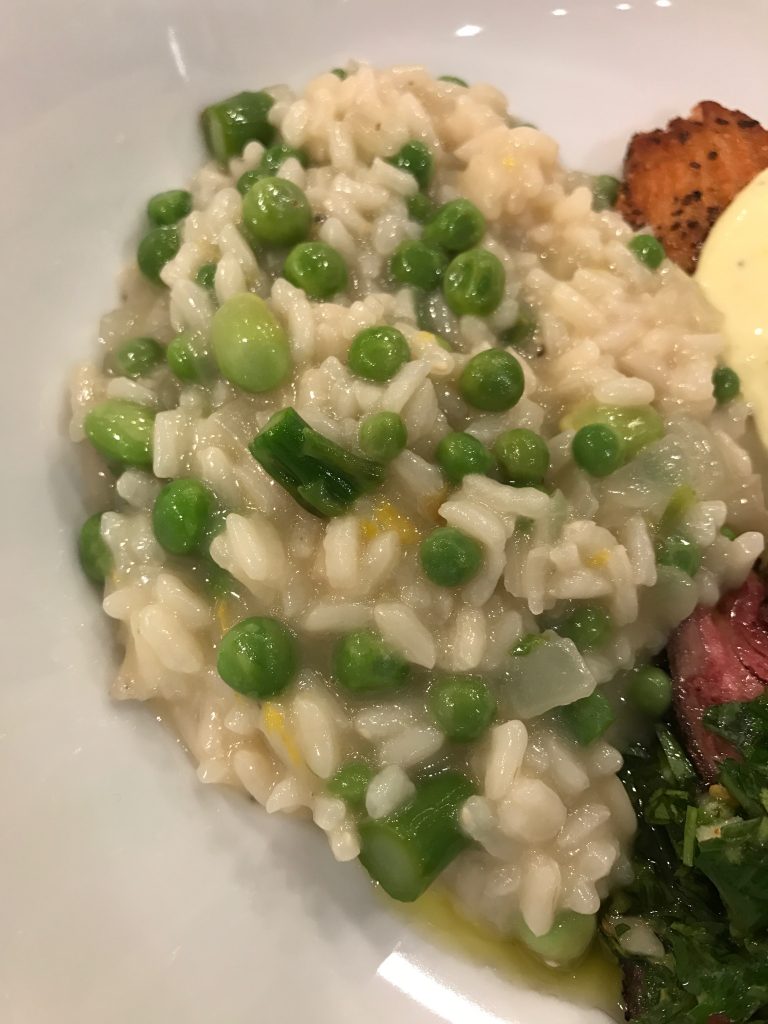This risotto manages to be savory and light at the same time with additions of peas that give it a springtime taste.